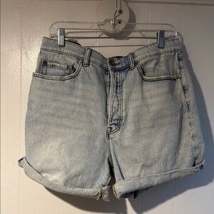 5 Inch Mom Jean Premium Classic Denim Mid-Rise Short Details https://www.torrid.